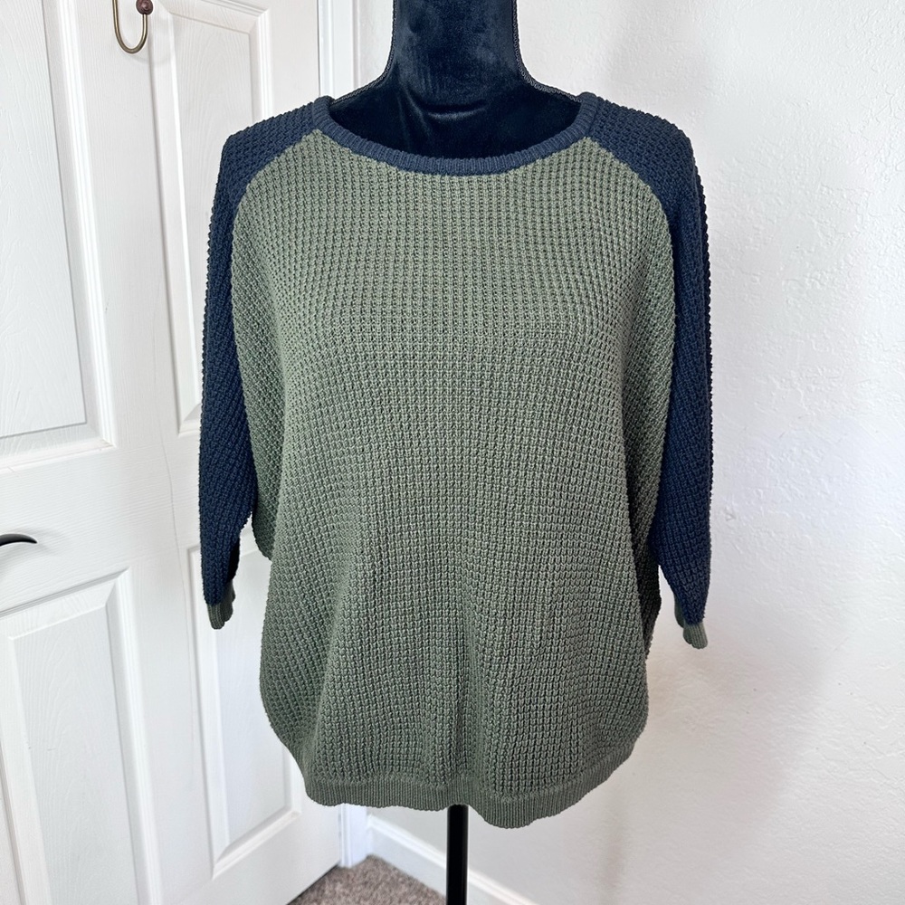 Green and black sweater
